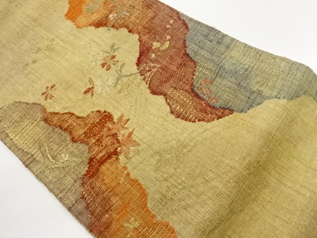 手織り紬金糸道長取りに草花模様織出し名古屋帯